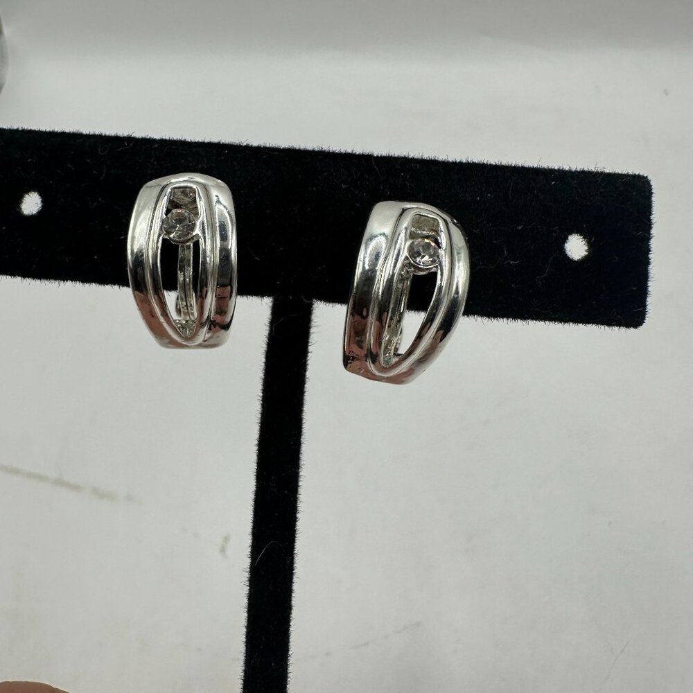 Vintage NWH Silver Clip-On Earrings With Rhinestone Accents